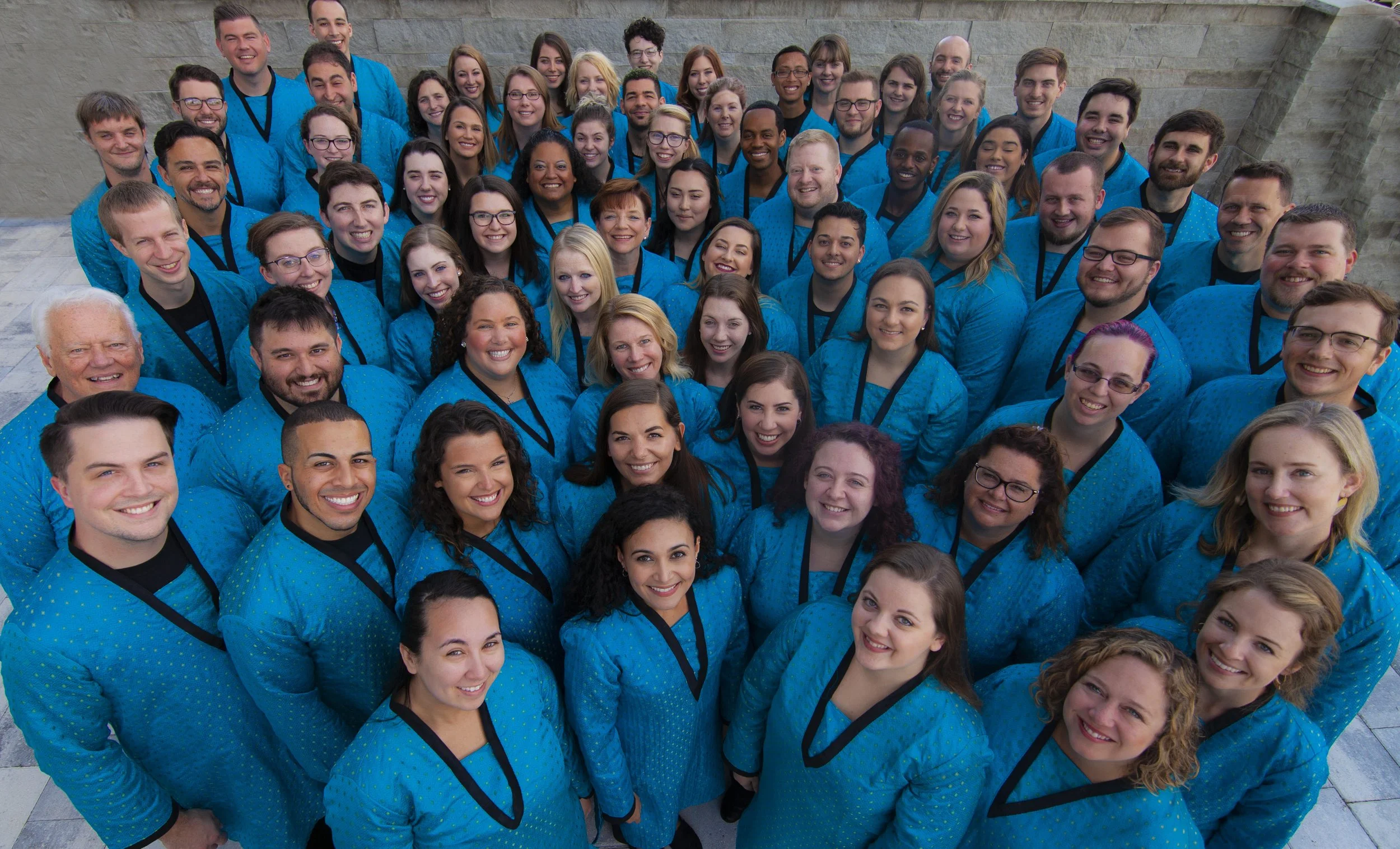 The Festival Singers of Florida ensemble in matching royal blue jackets